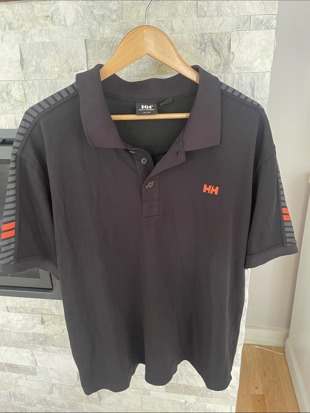 Helly Hansen Black Polo with Orange HH Logo and Sleeve Stripes